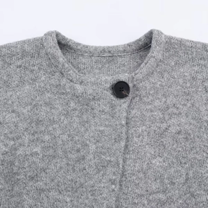 Chic light gray knit cardigan with round neck and black button detail for women