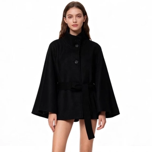 Women's black minimalist high neck poncho coat with waist belt and large buttons