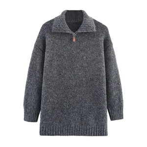 Dark grey loose knit sweater featuring half-zip collar and cozy mohair texture