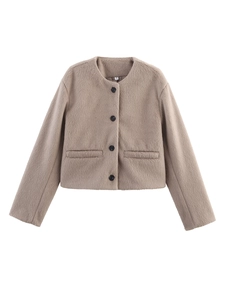 Detail view of light brown wool-blend jacket showing plush texture and four black buttons