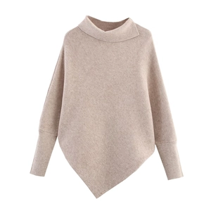 Beige ribbed knit poncho sweater with asymmetrical hem and batwing sleeves