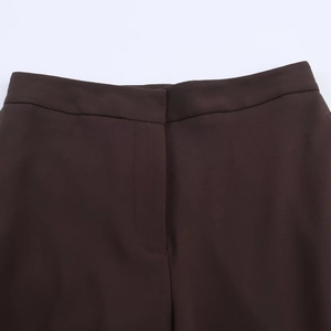 Deep brown straight-leg trousers with hidden waist closure and smooth texture