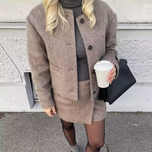 Women's oatmeal wool blend cropped jacket with round neck and brown button accents