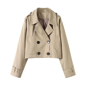 Short khaki double-breasted trench coat with wide lapels and shoulder epaulettes
