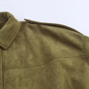 Macro detail of olive green faux suede bomber jacket collar and epaulette stitching