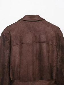 Close-up of brown faux suede jacket back showing collar and detailed stitching