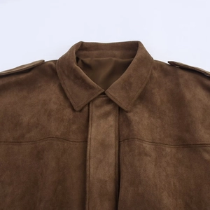 Detail of vintage dark brown faux suede bomber jacket with classic lapel and epaulets