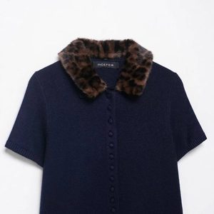 Short sleeve navy knit cardigan featuring an elegant leopard print faux fur collar