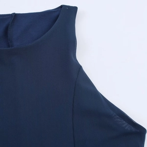 Detail of navy blue sleeveless mesh dress neckline with high-quality stitched lining