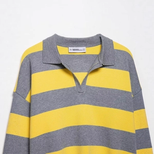 Striped knit polo sweater for women with grey and yellow horizontal bands and a V-neckline