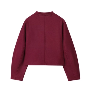 Rear view of burgundy short wool jacket showing tailored seams and textured fabric