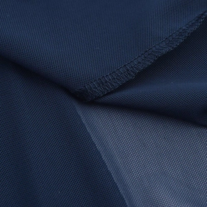 Detail of dark blue mesh fabric with fine stitching and lightweight translucent texture