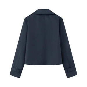 Rear view of cropped navy blue trench jacket with classic collar and adjustable sleeve cuffs