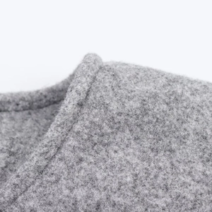 Close-up of the premium grey wool blend fabric and precise stitching of bomber jacket