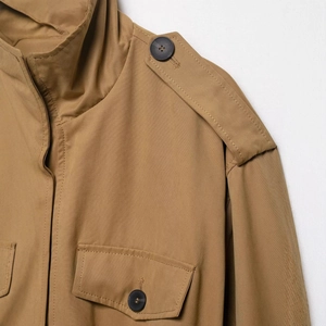 Classic khaki long-sleeve trench jacket with epaulettes and marble-textured buttons