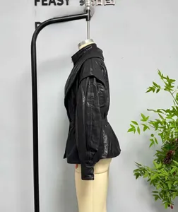 Detail of double-layered collar and textured faux leather on black motorcycle jacket