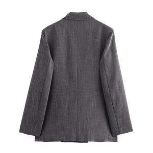 Women's dark grey blazer with shoulder pads and twill texture, professional back view
