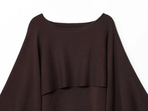 Detailed view of brown off-shoulder knitted top showing layered design and fine rib texture