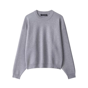 Light grey ribbed knit round neck sweater with dropped shoulders and a minimalist design