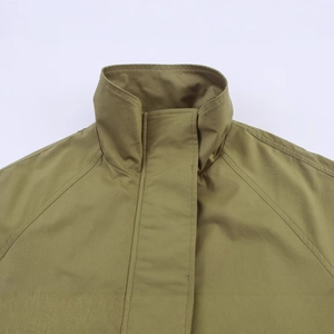 Women's oversized olive green parka jacket with high stand collar and utility pockets