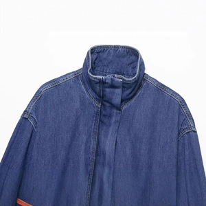 Women's dark blue denim jacket with high stand collar and dropped shoulders design