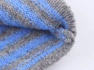 Macro view of blue and grey striped knit texture on this long-sleeve cardigan sweater