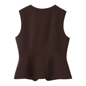 Detail of a dark coffee brown peplum vest with a crew neck and tailored waistline