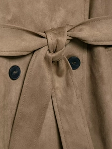 Detailed close-up of brown faux suede trench coat featuring tie waist belt and black buttons