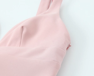 Detailed view of pink mini dress featuring a high-quality seamless side zipper closure