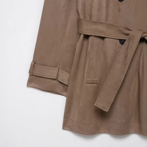 Women's mid-length tan faux suede trench coat with adjustable waist belt and matte buttons