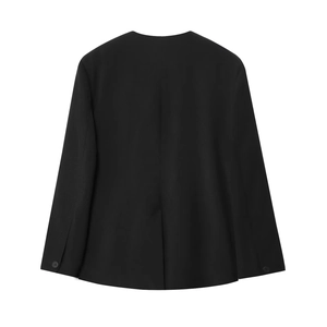 Detail of black woven blazer back showing central seam and tonal cuff buttons