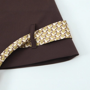 Deep brown women's strapless top with vintage geometric patterned tie belt detail