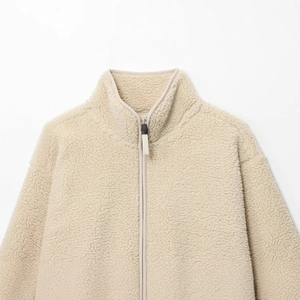 Women's cozy beige sherpa fleece half-zip jacket with a standing collar for winter warm wear