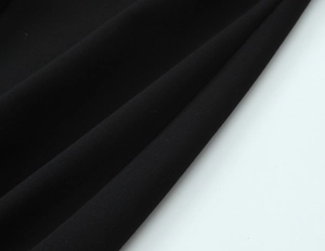 Dettaglio macro del tessuto twill nero di alta qualità con finitura opaca