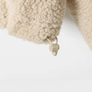 Women's beige sherpa fleece pullover with adjustable drawstring and toggle closure