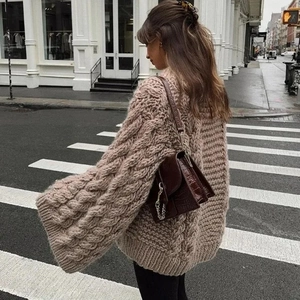 Oversized oatmeal cable knit sweater with drop shoulder and street style design