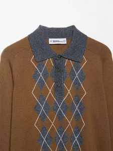 Close-up of brown argyle knit polo shirt featuring grey contrast collar and button detail