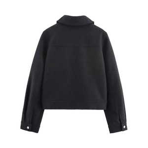 Back view of a cropped black wool jacket featuring a classic collar and yoke seam details