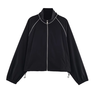 Minimalist black nylon puffer jacket with white piping and adjustable drawstring hem