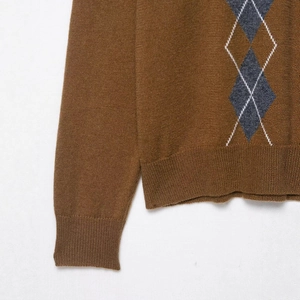 Women's argyle knit polo sweater in caramel brown with grey diamond patterns