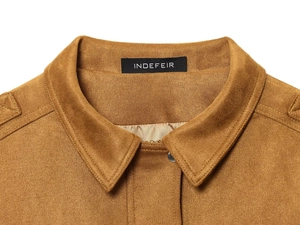 Close-up of suede texture collar with silver metal snap button on brown bomber jacket