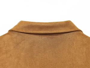 Close-up of the double-stitched lapel collar on a brown faux suede bomber jacket