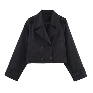 Detail of short black trench coat with double-breasted buttons and epaulets