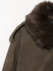 Macro view of luxurious faux suede jacket with a thick detachable dark brown faux fur collar