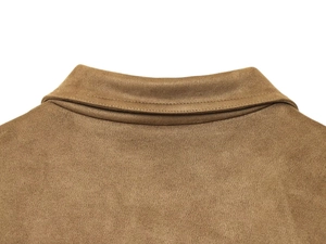 Detail of suede texture and reinforced stitching on the brown bomber jacket collar