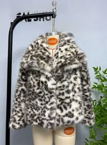 Detailed view of women's leopard print faux fur jacket with wide lapel and black accents