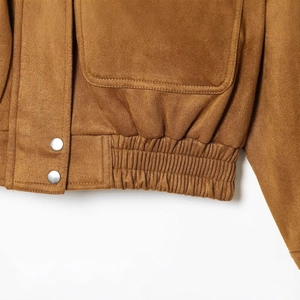 Brown faux suede bomber jacket featuring flap pockets and elastic hem with silver buttons