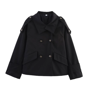 Detail of a black double-breasted trench jacket with notch lapels and size S label