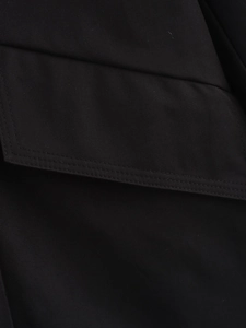 Close-up of premium black twill fabric texture and reinforced double-row stitching detail