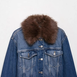 Women denim jacket with brown faux fur collar and metal buttons on white background